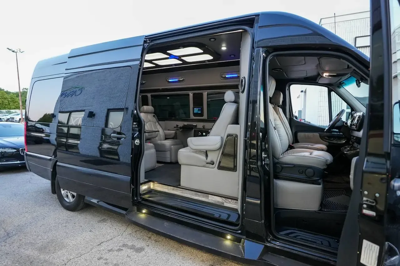Black VIP Sprinter with its sliding door open