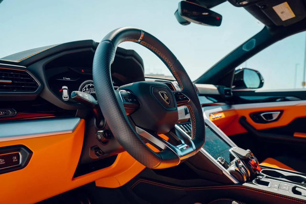 Lamborghini Urus cockpit in orange leather